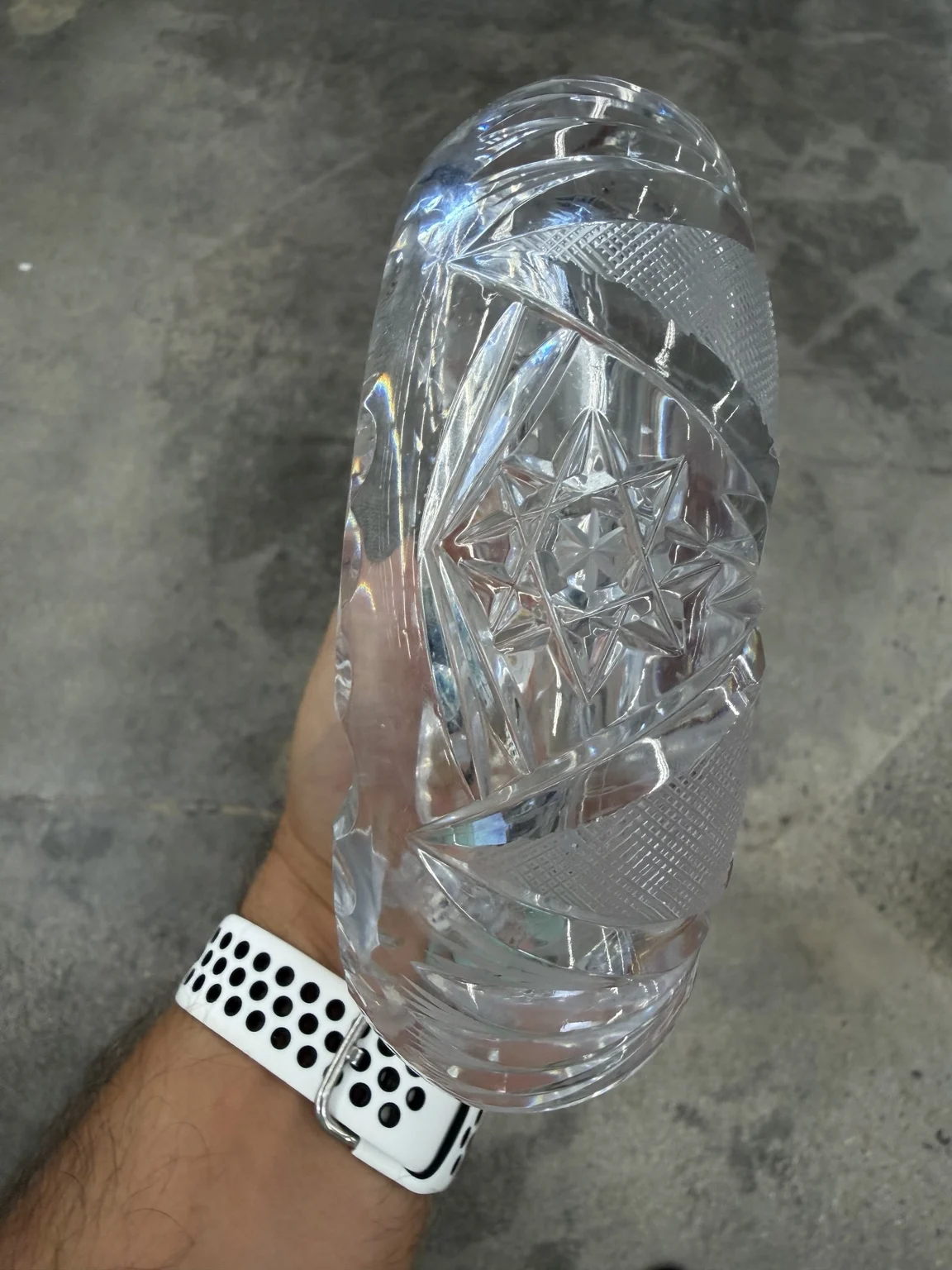 Side view of the ashtray showing its unusually thick walls, deep bowl and massive clear base.